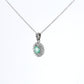Colombian Emerald Pendant: 0.70 ct tw Emeralds, 0.40 ct tw Diamonds, 14K White Gold