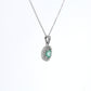 Colombian Emerald Pendant: 0.70 ct tw Emeralds, 0.40 ct tw Diamonds, 14K White Gold