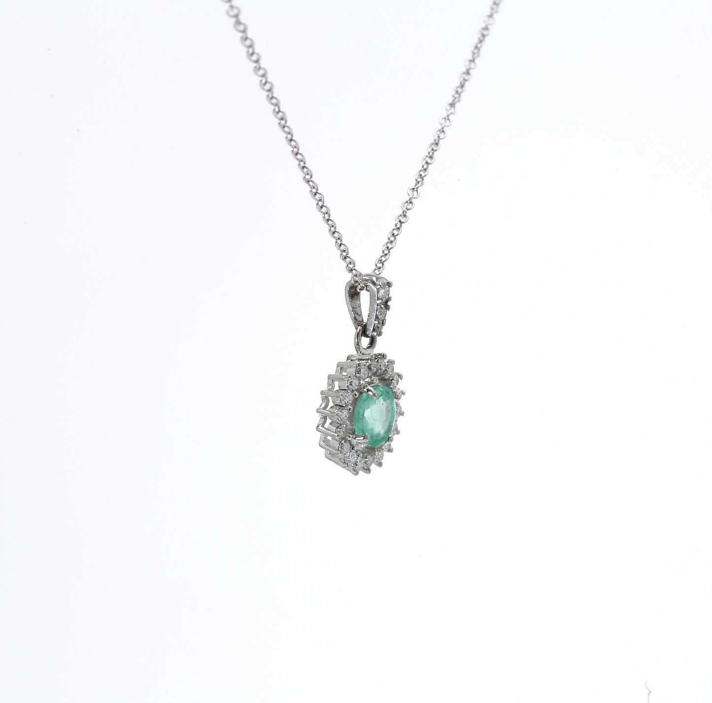 Colombian Emerald Pendant: 0.70 ct tw Emeralds, 0.40 ct tw Diamonds, 14K White Gold