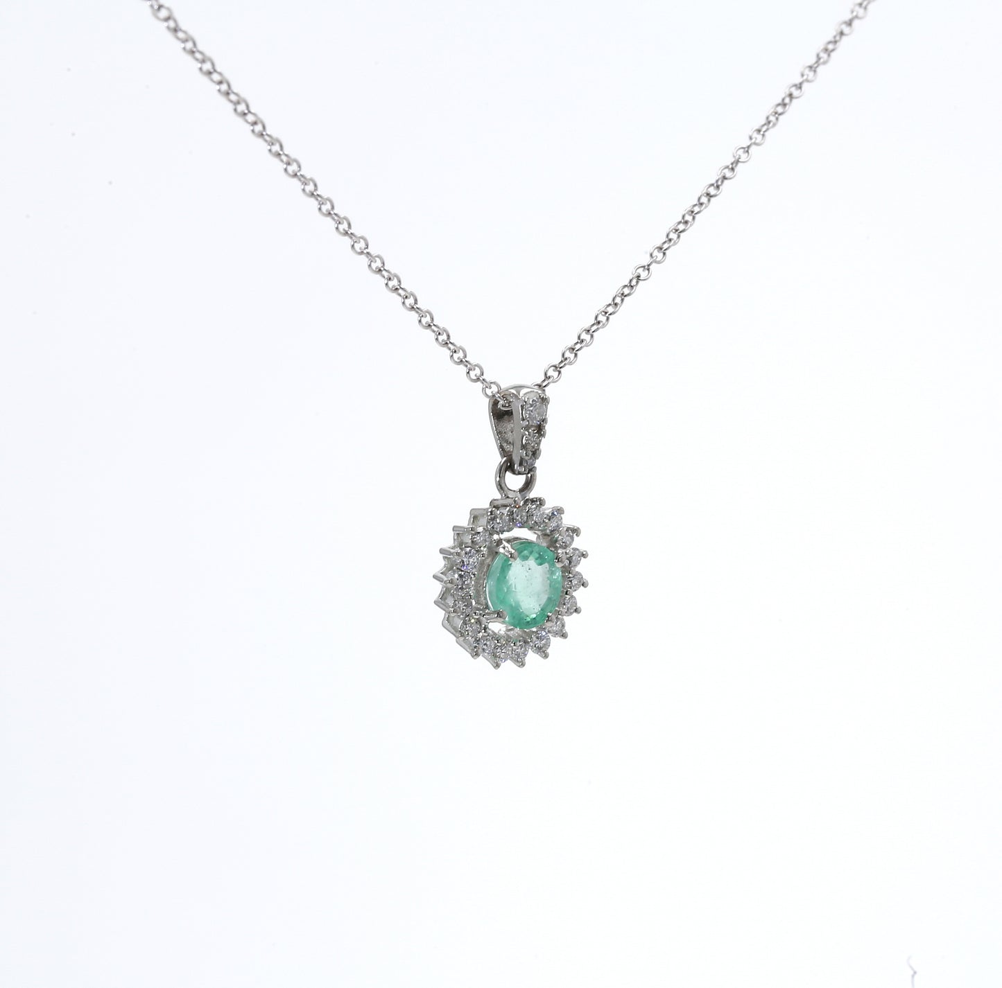 Colombian Emerald Pendant: 0.70 ct tw Emeralds, 0.40 ct tw Diamonds, 14K White Gold