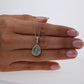 Colombian Emerald Pendant: 1.55 ct tw Emeralds, 0.70 ct tw Diamonds, 14K White Gold