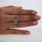 Colombian Emerald Pendant: 0.70 ct tw Emeralds, 0.70 ct tw Diamonds, 14K White Gold