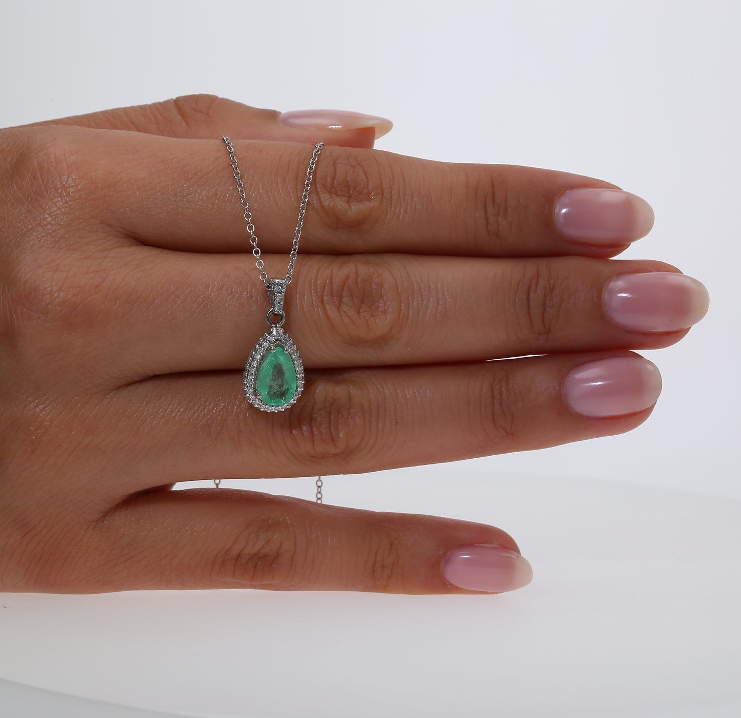 Colombian Emerald Pendant: 0.70 ct tw Emeralds, 0.70 ct tw Diamonds, 14K White Gold